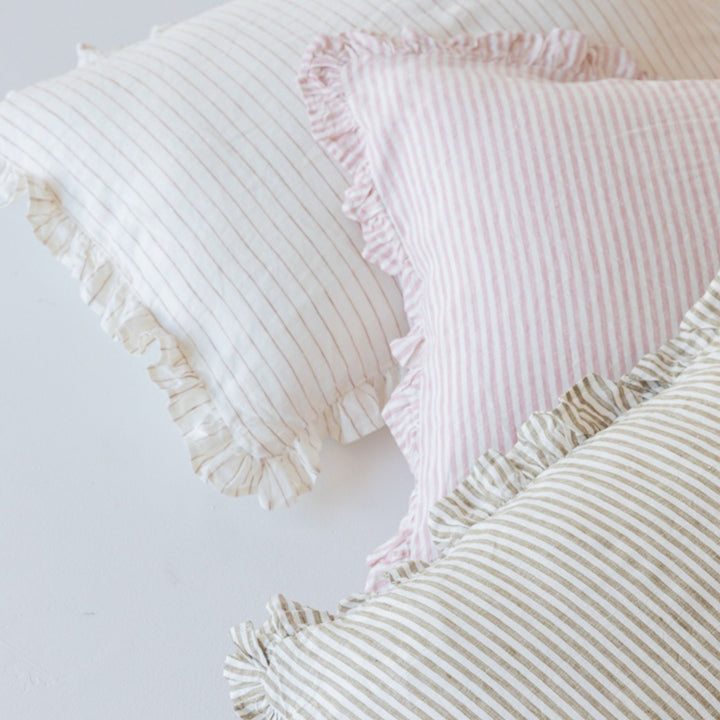 Foxtrot Home French Flax Linen styled in a bedroom with Stripes Ruffles Cushion Covers