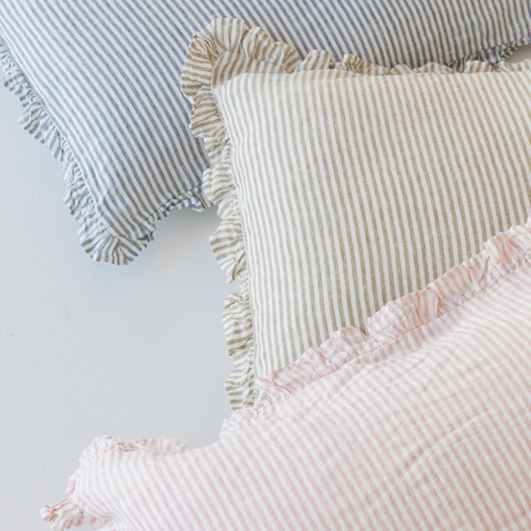 Foxtrot Home French Flax Linen styled in a bedroom with Stripes Ruffles Cushion Covers