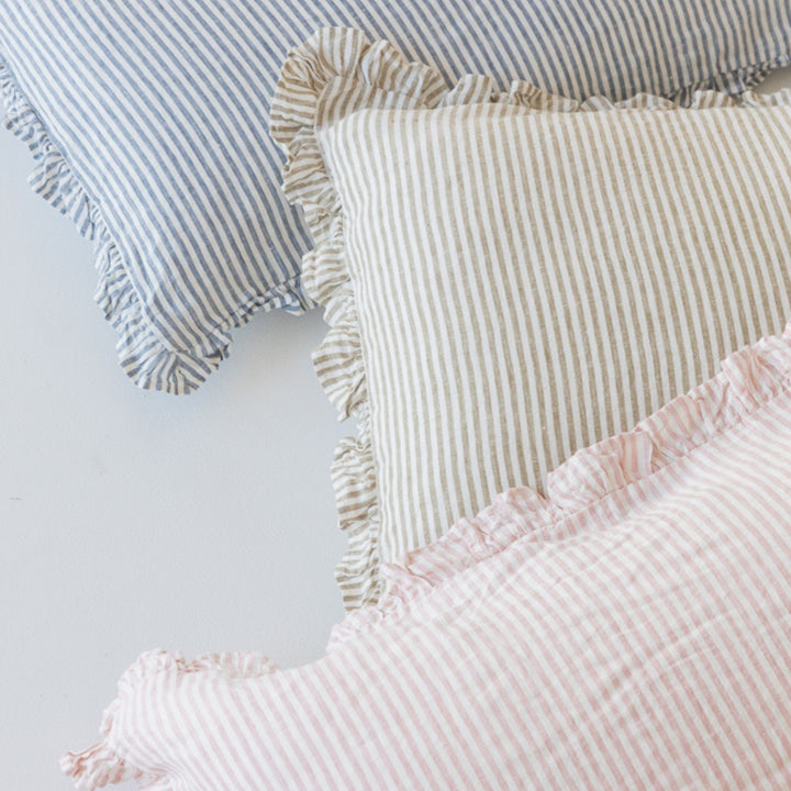 Foxtrot Home French Flax Linen styled in a bedroom with Stripes Ruffles Cushion Covers