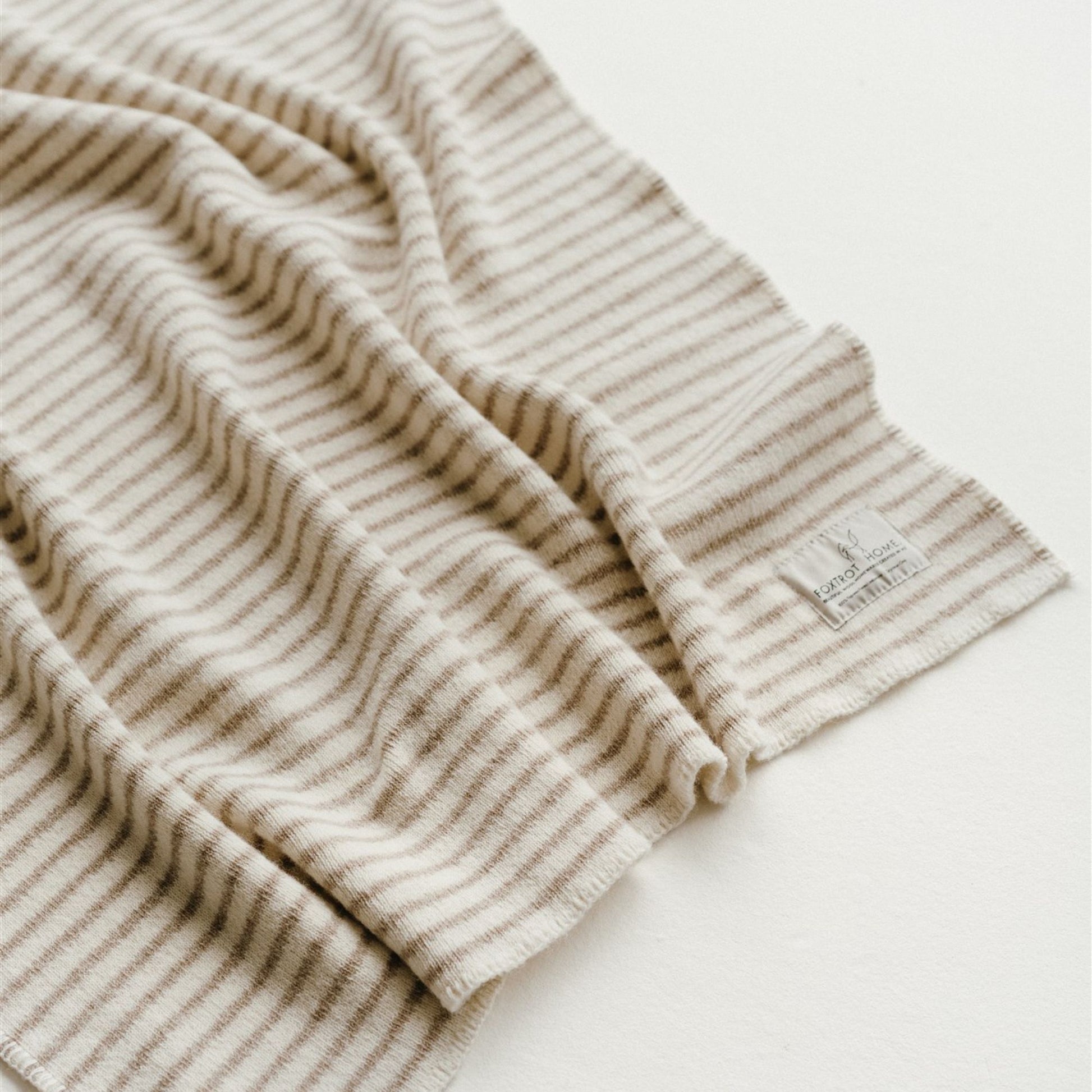 Foxtrot Home New Zealand Wool Throw Blanket in Sand Stripes