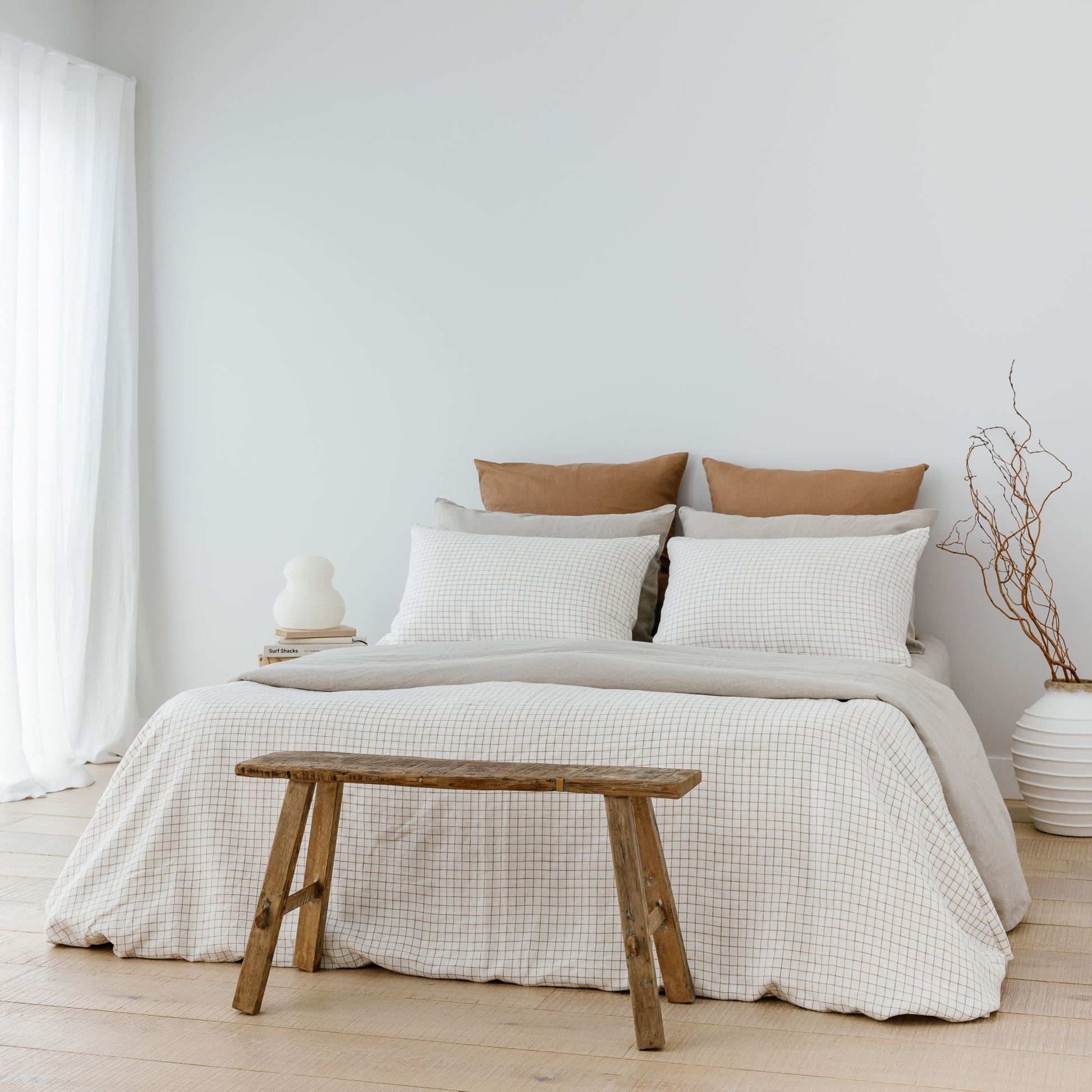 Foxtrot Home French Flax Linen styled with Malt Brown Grid Duvet and Natural Sheets