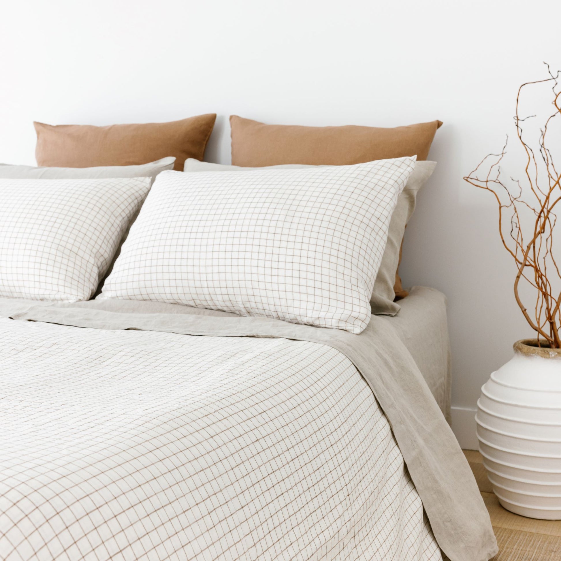 Foxtrot Home French Flax Linen styled with Malt Brown Grid Duvet and Natural Sheets