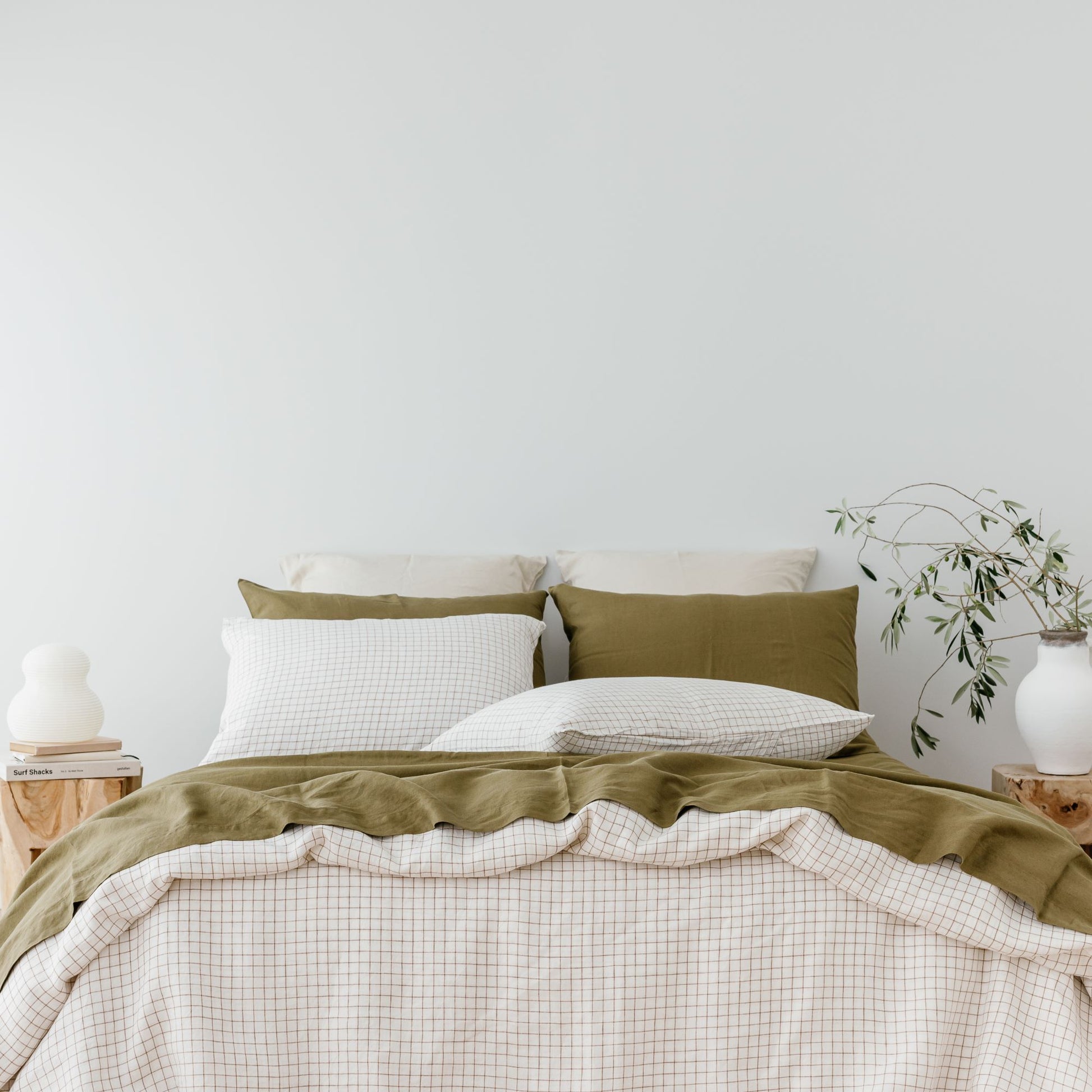 Foxtrot Home French Flax Linen styled with Malt Brown Grid Duvet and Olive Sheets