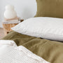 Foxtrot Home French Flax Linen styled with a Malt Brown Grid Duvet and Olive Sheets