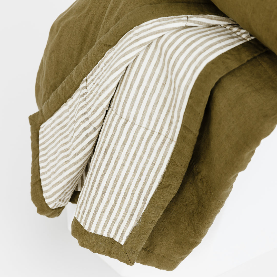 Foxtrot Home French Flax Linen Quilt in Olive with Olive Stripes on the reverse