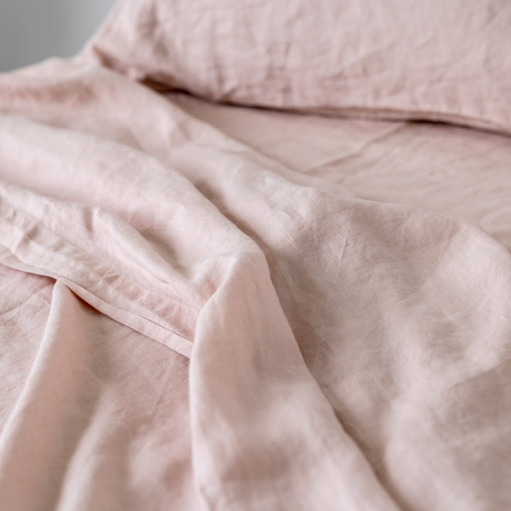 Foxtrot Home French Flax Linen styled in a bedroom with Blush Pink Pillowcases.