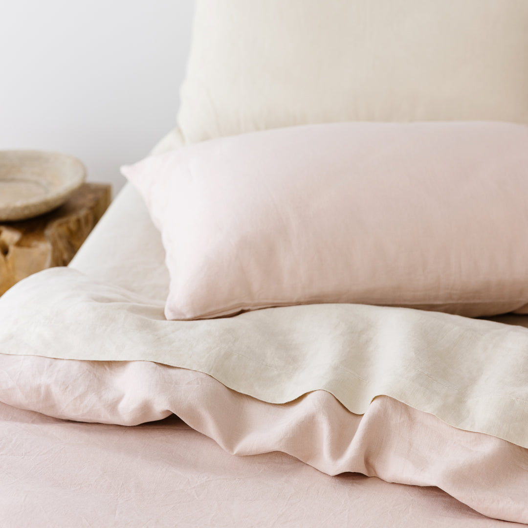 Foxtrot Home French Flax Linen styled in a bedroom with Blush Pink Pillowcases.