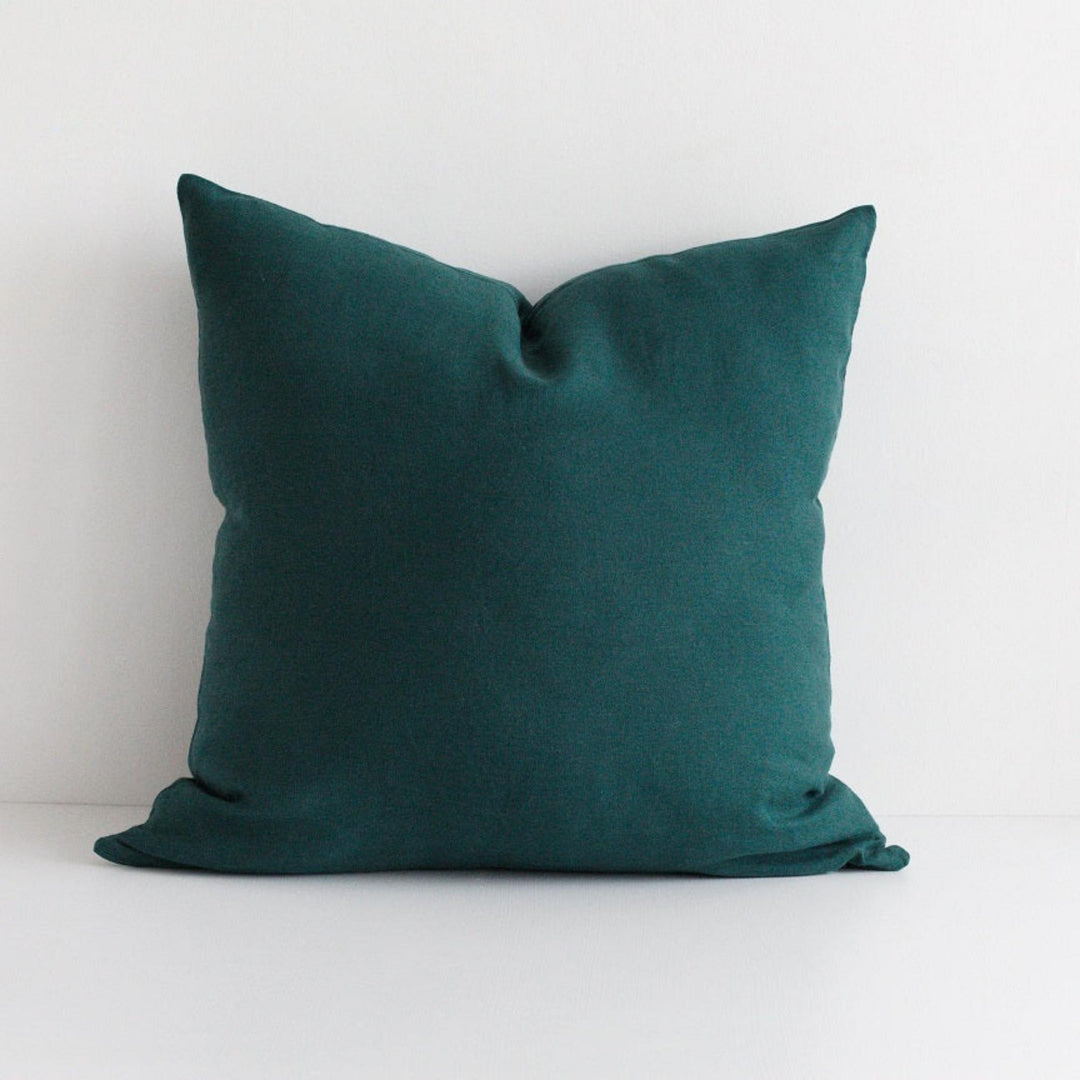 Foxtrot Home French Flax Linen styled in a bedroom with Botanical Green Cushion Cover.