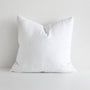 Foxtrot Home French Flax Linen styled in a bedroom with Brilliant White Cushion Cover.