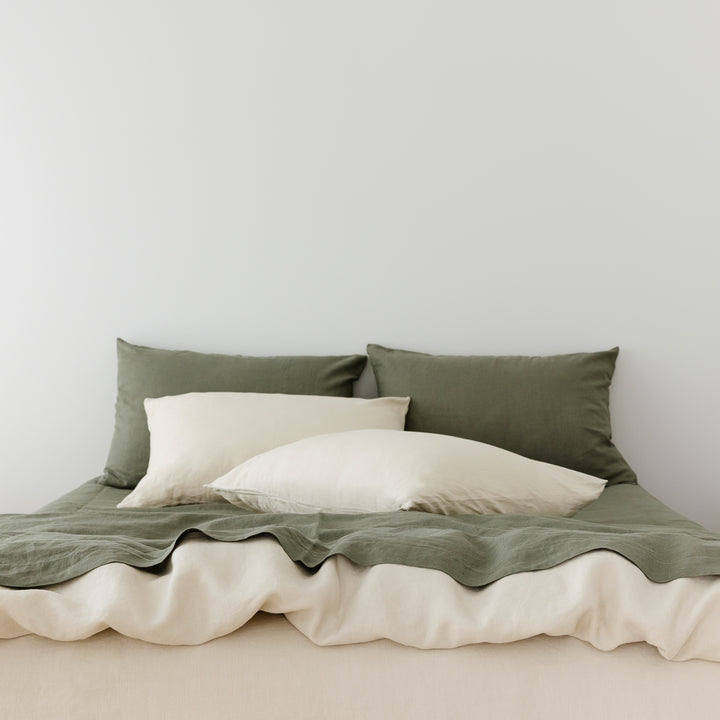 Foxtrot Home French Flax Linen styled in a bedroom with Cactus Green Fitted Sheet.