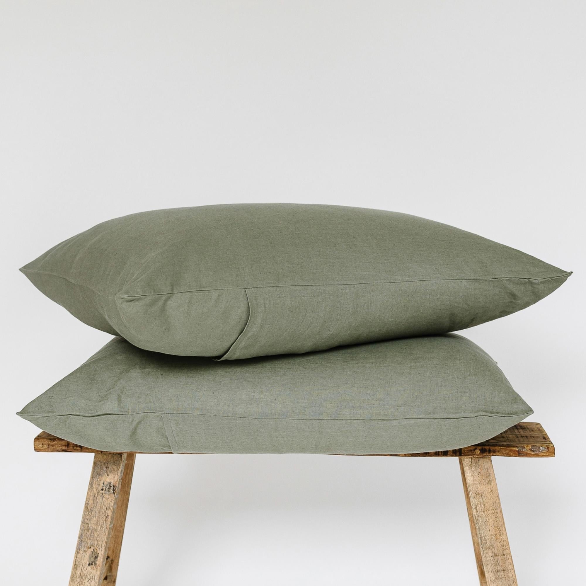 Foxtrot Home French Flax Linen styled in a bedroom with Cactus Green Pillowcases.