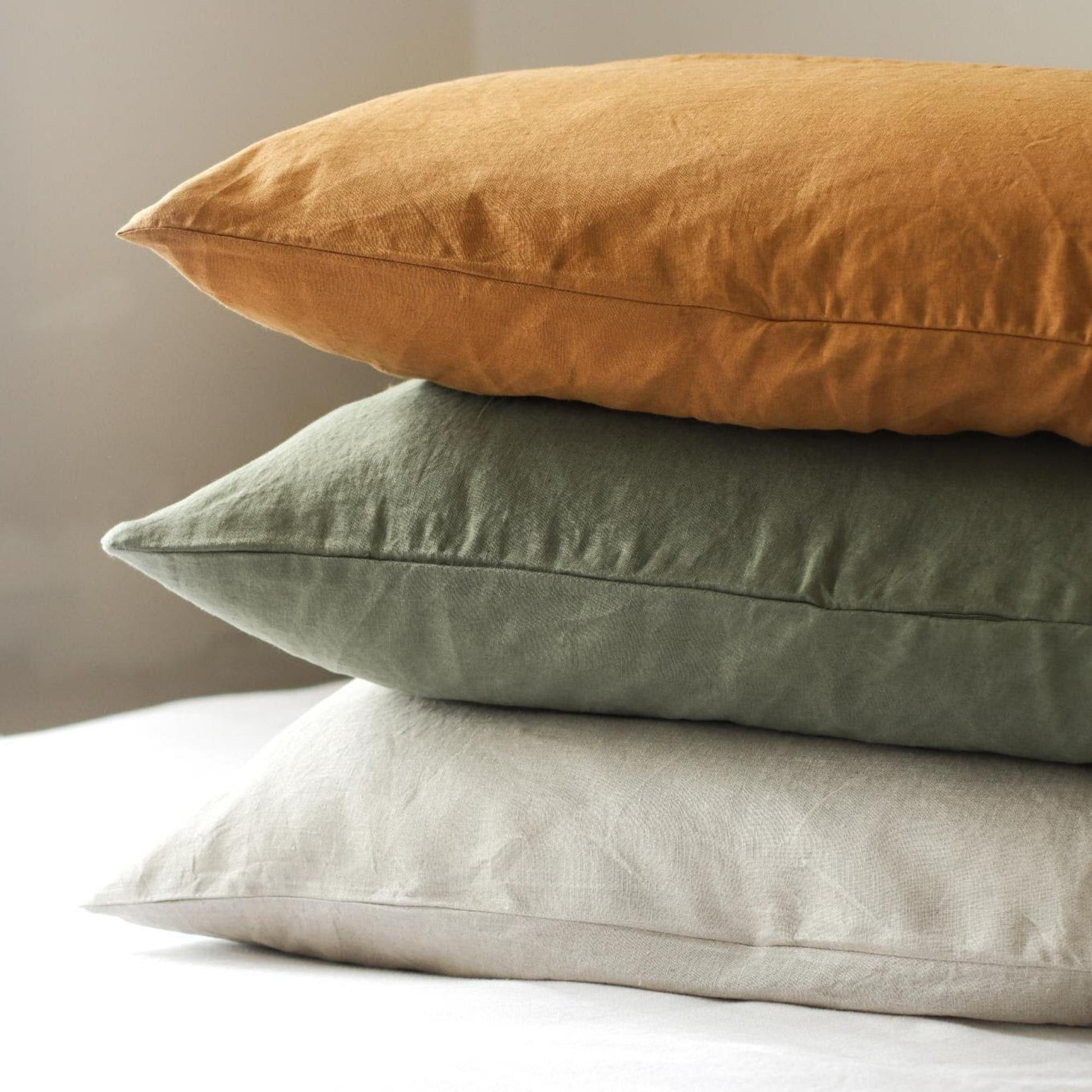 Foxtrot Home French Flax Linen styled in a bedroom with Cactus Green Pillowcases.