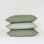 Foxtrot Home French Flax Linen styled in a bedroom with Cactus Green Pillowcases.