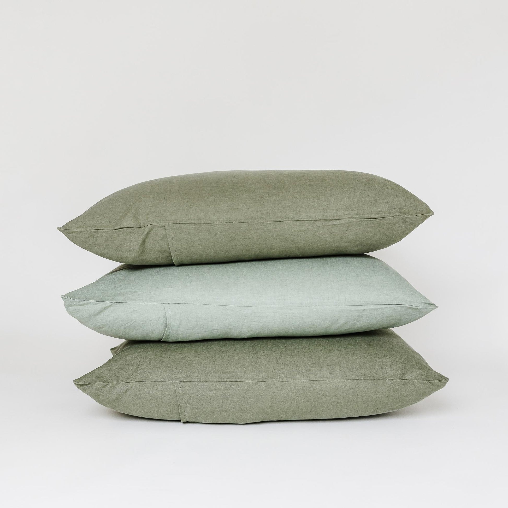 Foxtrot Home French Flax Linen styled in a bedroom with Cactus Green Pillowcases.