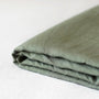 Foxtrot Home French Flax Linen styled in a bedroom with Cactus Green Sheets Set.
