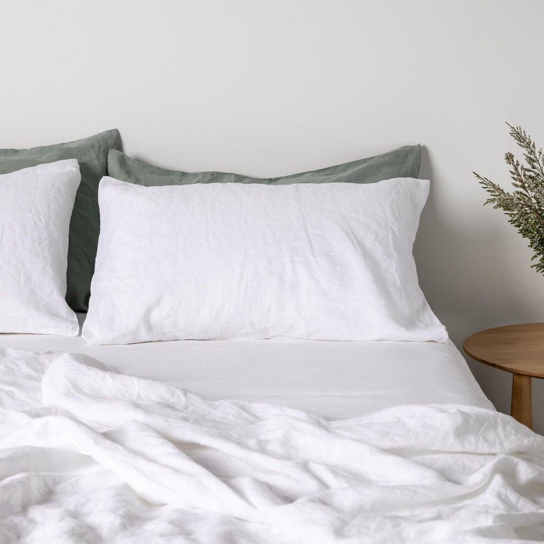 Foxtrot Home French Flax Linen styled in a bedroom with Brilliant White Flat Sheet.