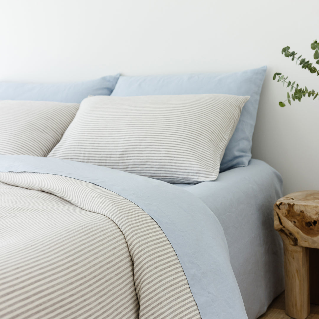 Foxtrot Home French Flax Linen styled in a bedroom with Grey Stripes Duvet.