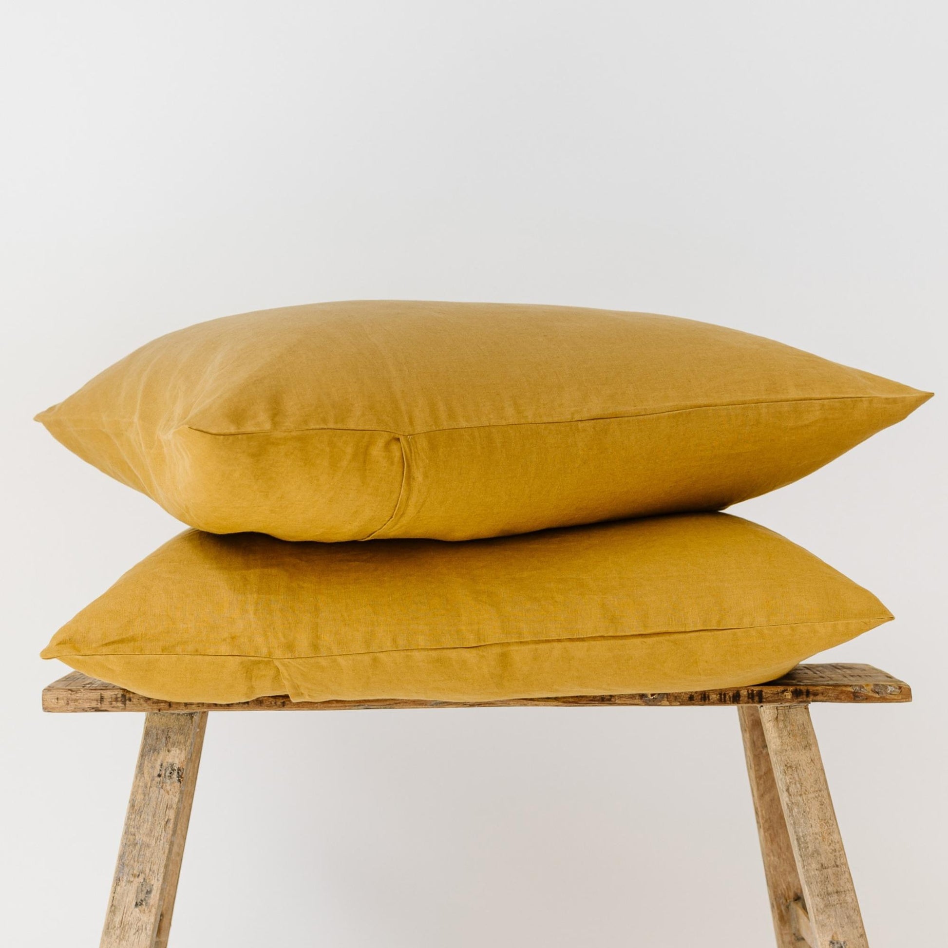 Foxtrot Home French Flax Linen styled in a bedroom with Honey Ginger Pillowcases.