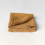 Foxtrot Home French Flax Linen styled in a bedroom with Honey Ginger Pillowcases.
