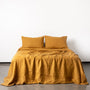 Foxtrot Home French Flax Linen styled in a bedroom with Honey Ginger Pillowcases.