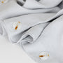 Foxtrot Home French Flax Linen styled in a bedroom with Light Grey Duvet.