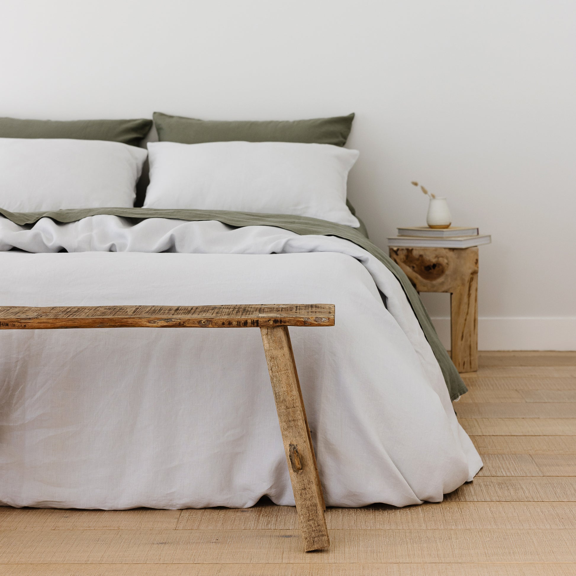 Foxtrot Home French Flax Linen styled in a bedroom with Light Grey Duvet.