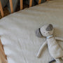 Foxtrot Home French Flax Linen styled in a baby's bedroom with a Natural Cot Duvet.