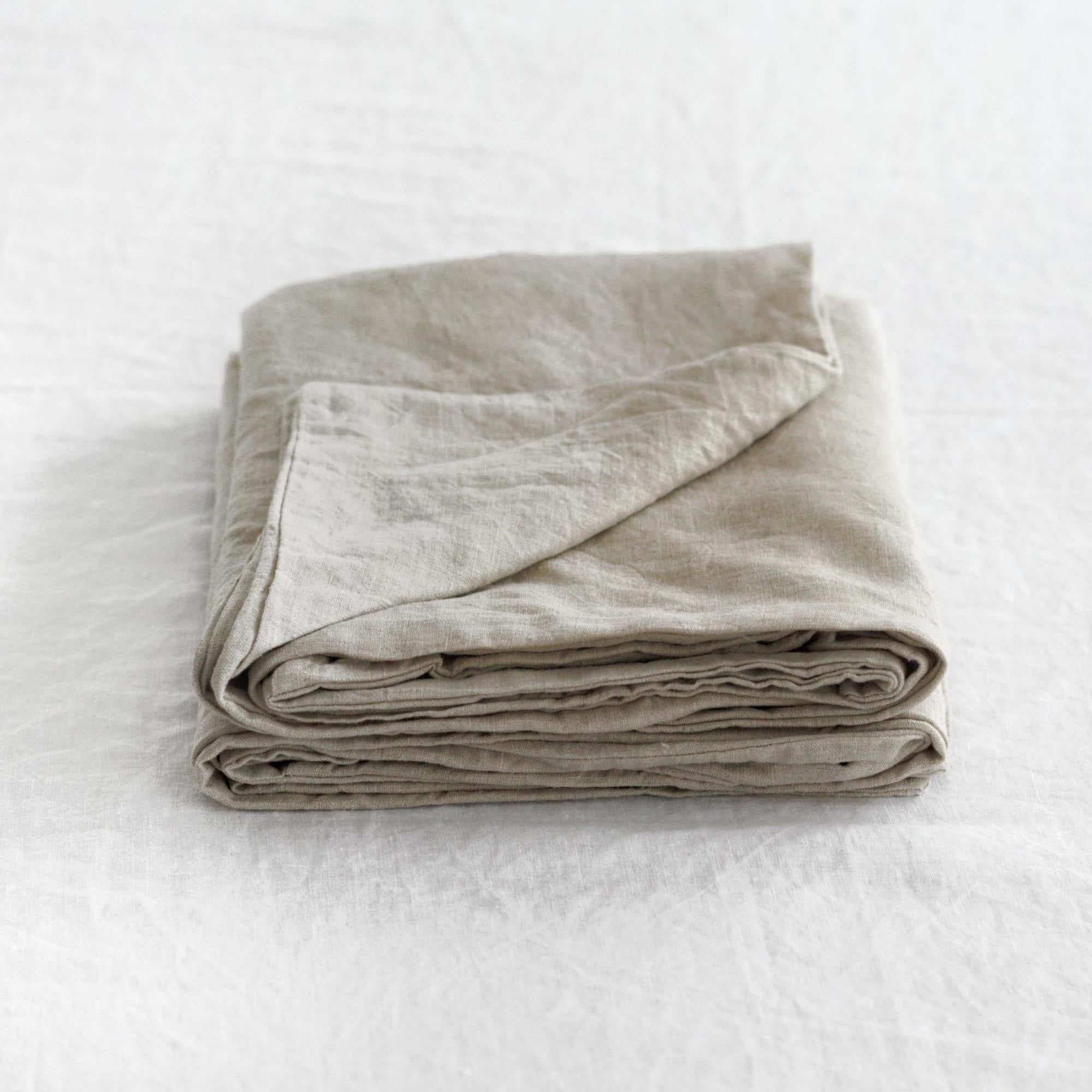 Foxtrot Home French Flax Linen styled in a bedroom with Natural Pillowcases.