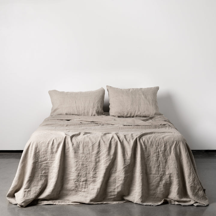 Foxtrot Home French Flax Linen styled in a bedroom with Natural Sheets Sets.