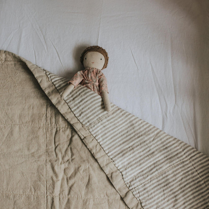 Foxtrot Home French Flax Linen styled in a bedroom with Natural & Grey Stripes Quilt.