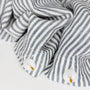 Foxtrot Home French Flax Linen styled in a bedroom with Navy Stripes Duvet.