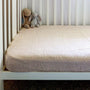 Foxtrot Home French Flax Linen styled in a baby's bedroom with a Pink Stripes Cot Duvet.