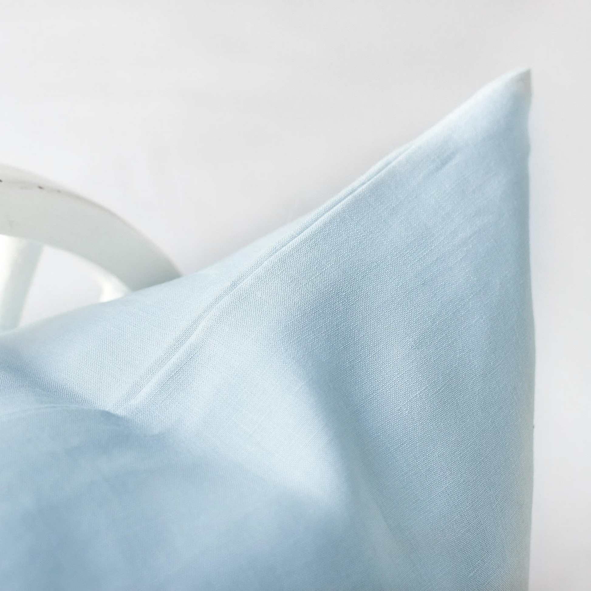 Foxtrot Home French Flax Linen styled in a bedroom with Powder Blue Pillowcases.