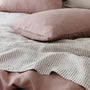Foxtrot Home French Flax Linen styled in a bedroom with Rosewood Duvet, Grey Stripes and Pillowcases.