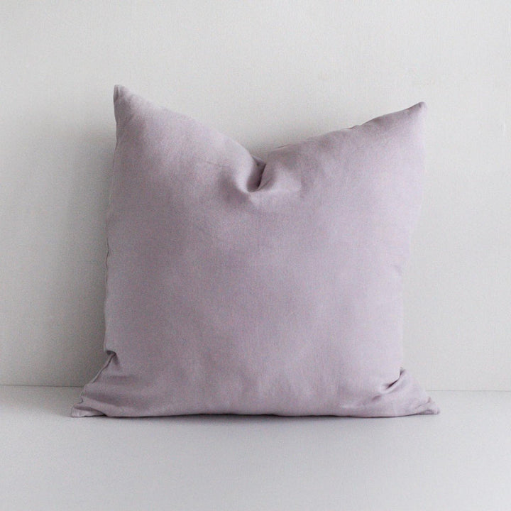 Foxtrot Home French Flax Linen styled in a bedroom with Lilac Purple Cushion Cover.