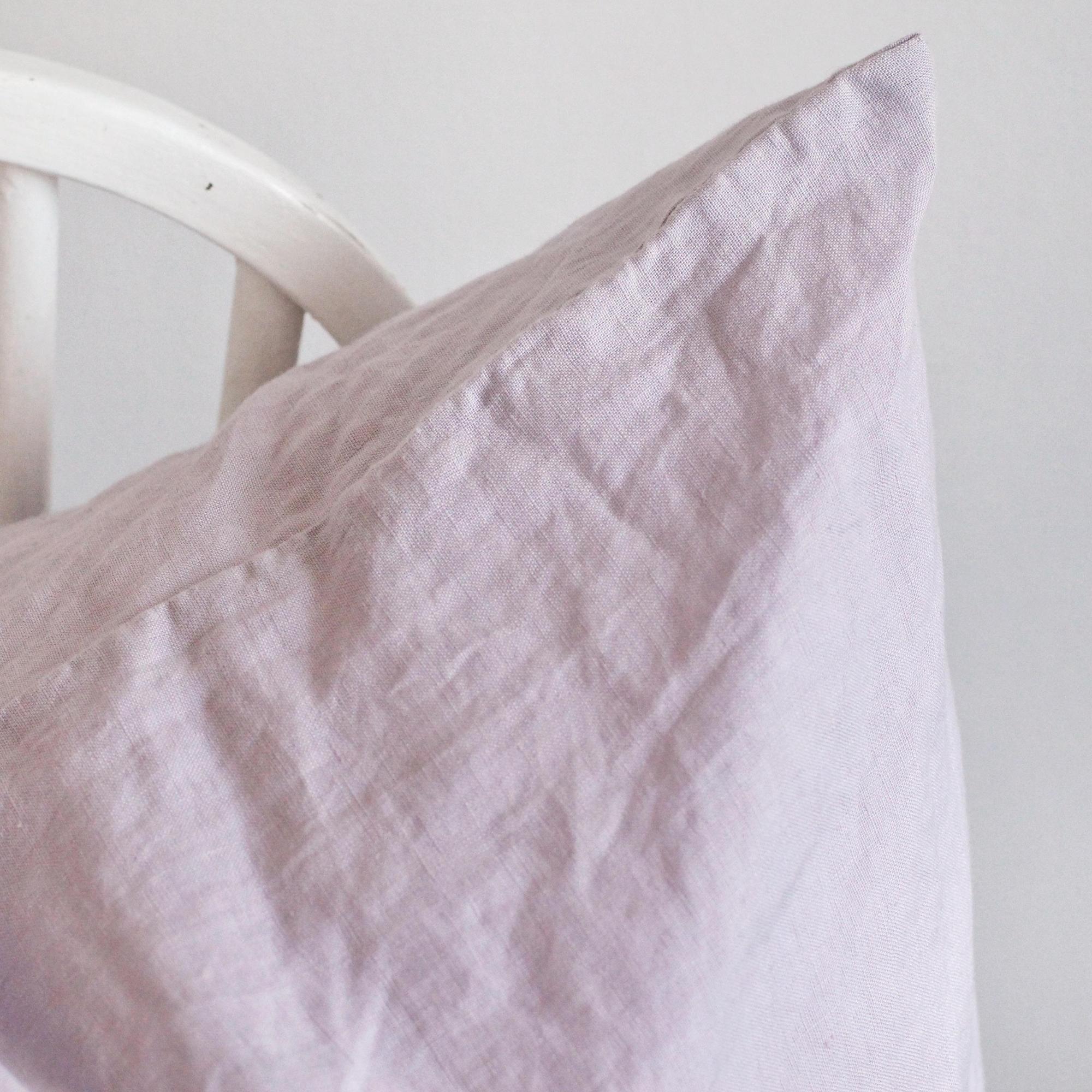 Foxtrot Home French Flax Linen styled in a bedroom with Lilac Purple Cushion Cover.