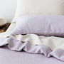 Foxtrot Home French Flax Linen styled in a bedroom with Lilac Purple Duvet.