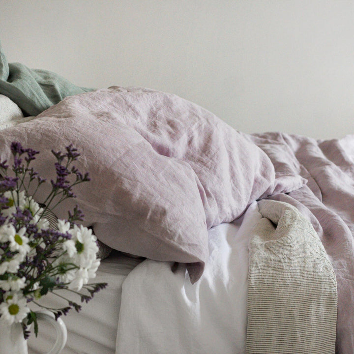 Foxtrot Home French Flax Linen styled in a bedroom with Lilac Purple Flat Sheet.