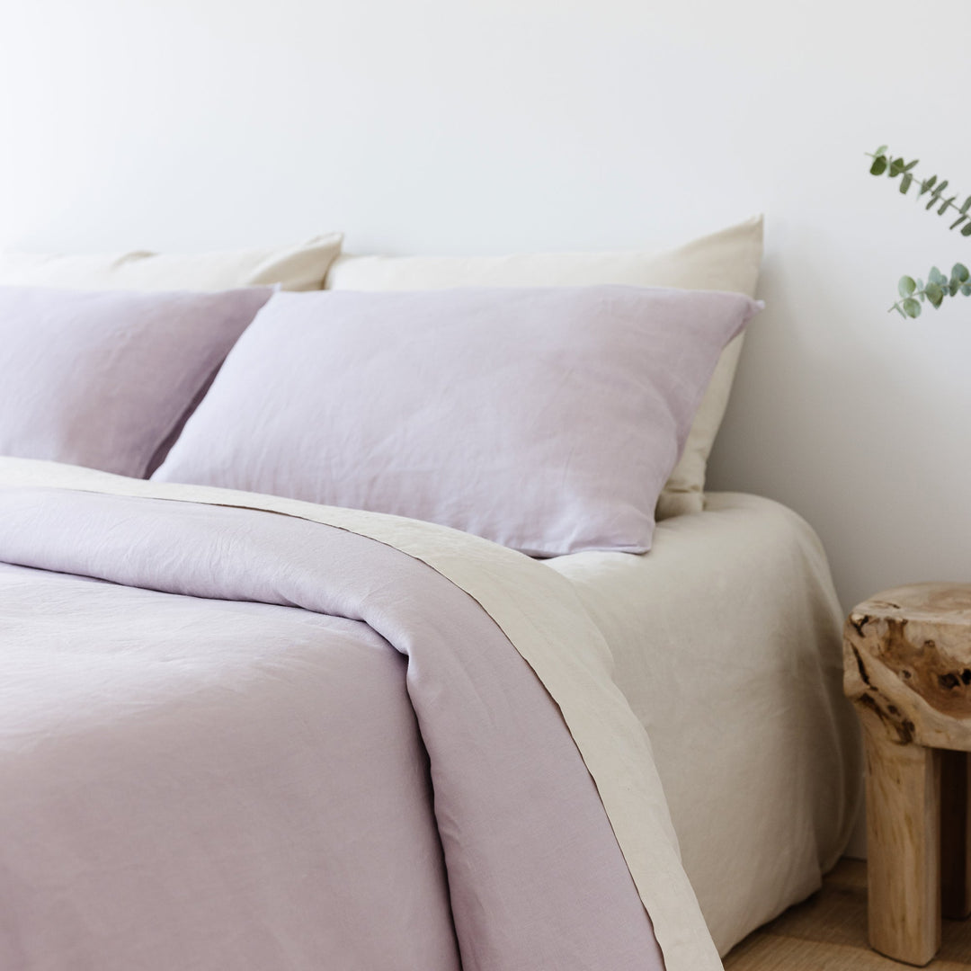 Foxtrot Home French Flax Linen styled in a bedroom with Lilac Pillowcases.