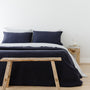 Foxtrot Home French Flax Linen styled in a bedroom with Midnight Blue Duvet.
