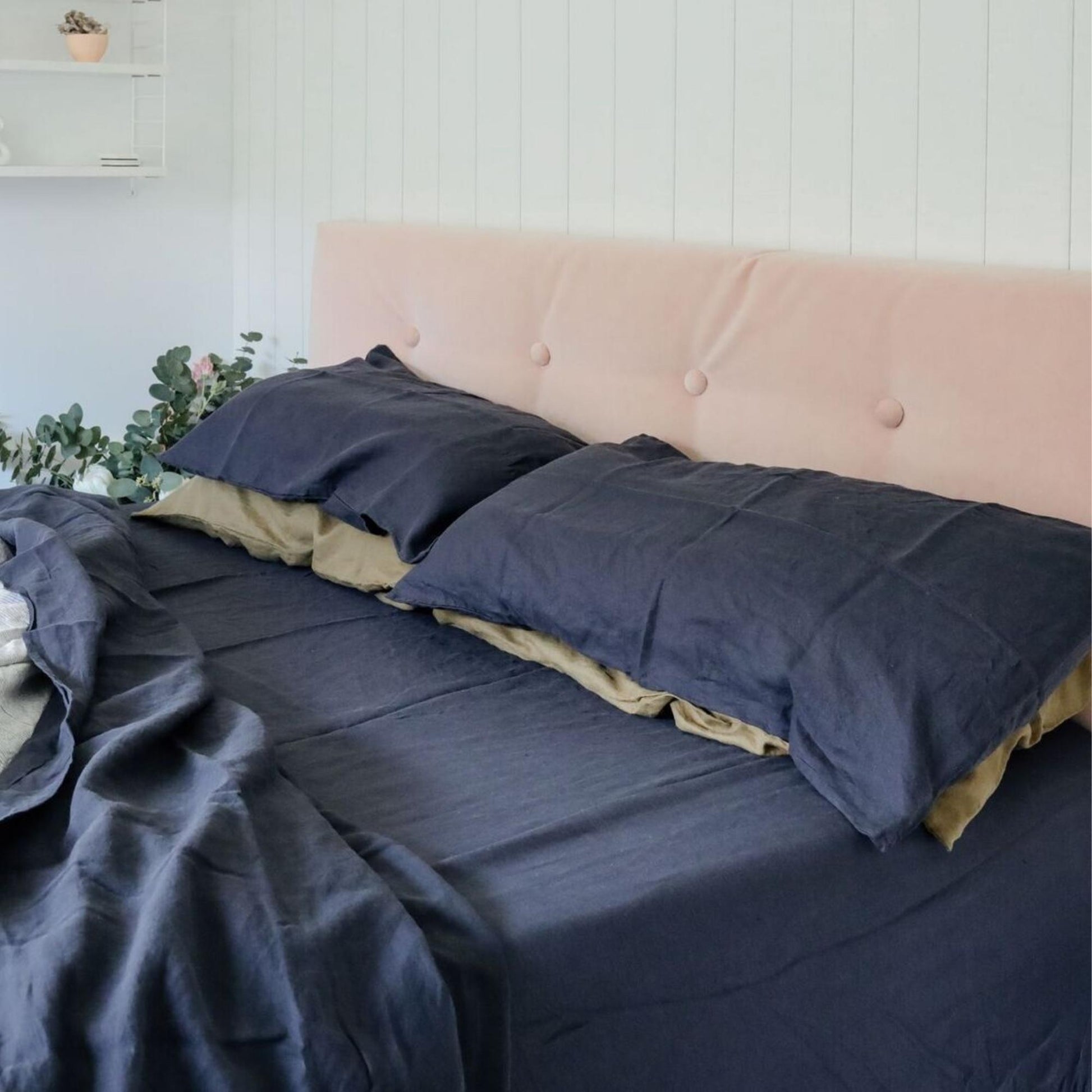 Foxtrot Home French Flax Linen styled in a bedroom with Midnight Blue Fitted Sheet.
