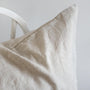 Foxtrot Home French Flax Linen styled in a bedroom with Natural Cushion Cover.