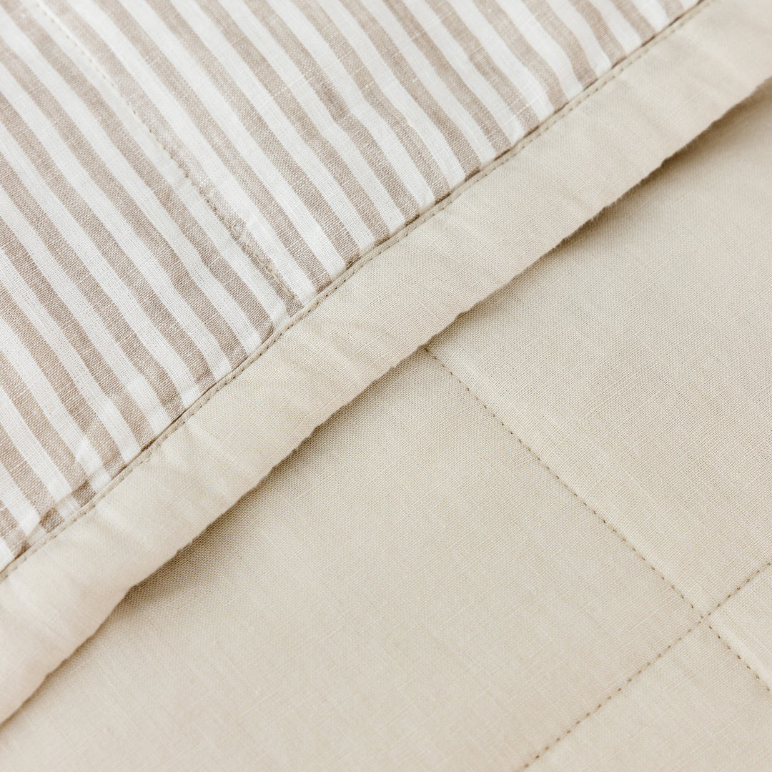 Foxtrot Home French Flax Linen Quilt in Oat with Sand Stripes on the reverse