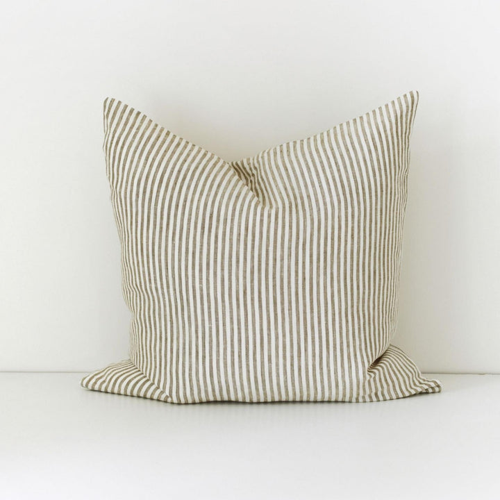 Foxtrot Home French Flax Linen styled in a bedroom with Olive Green Stripes Cushion Cover.