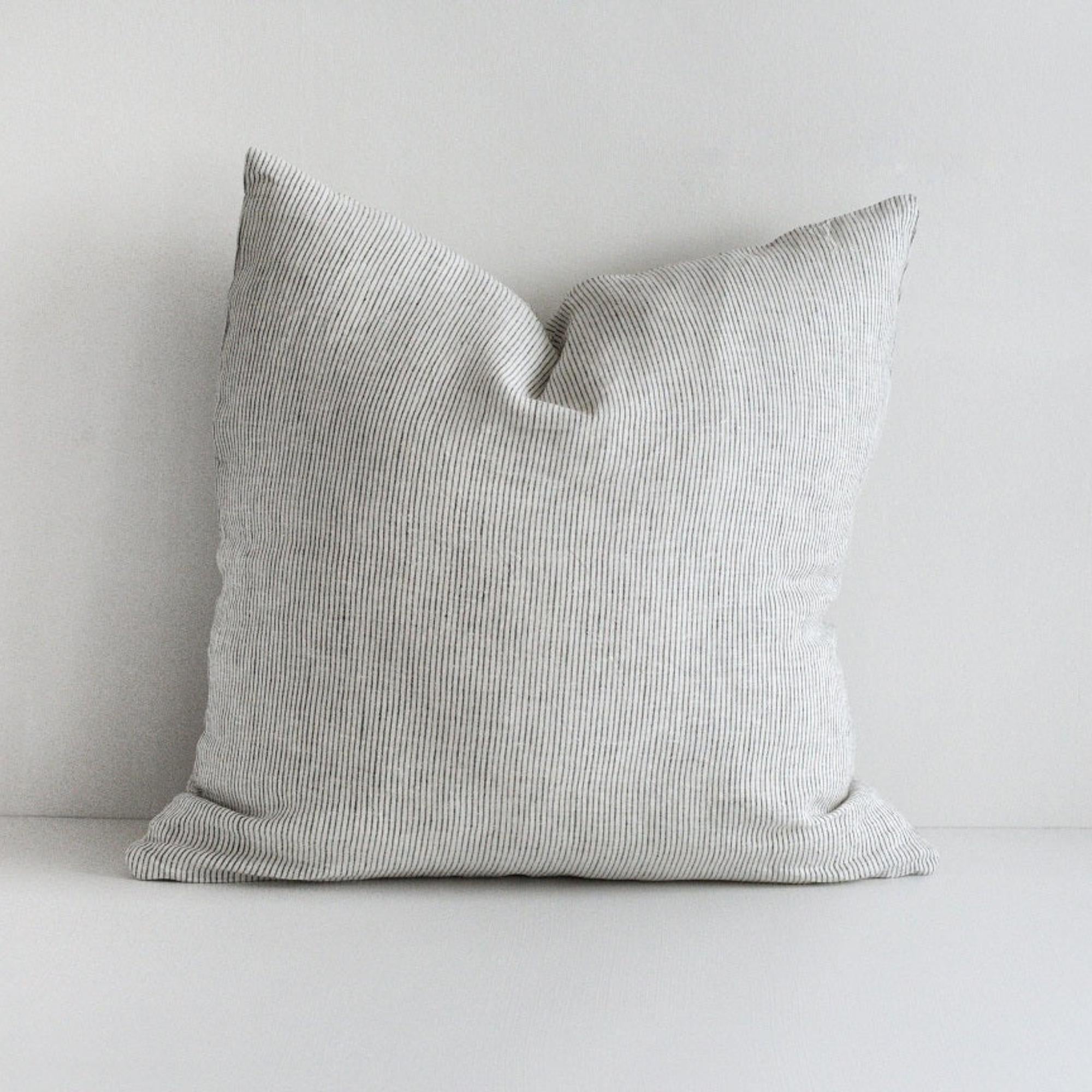 Foxtrot Home French Flax Linen styled in a bedroom with Pinstripes Cushion Cover.