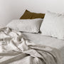Foxtrot Home French Flax Linen styled in a bedroom with Pinstripe Sheets Sets.