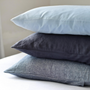 Foxtrot Home French Flax Linen styled in a bedroom with Powder Blue Duvet, Grey Stripes Sheets Sets and Pillowcases.