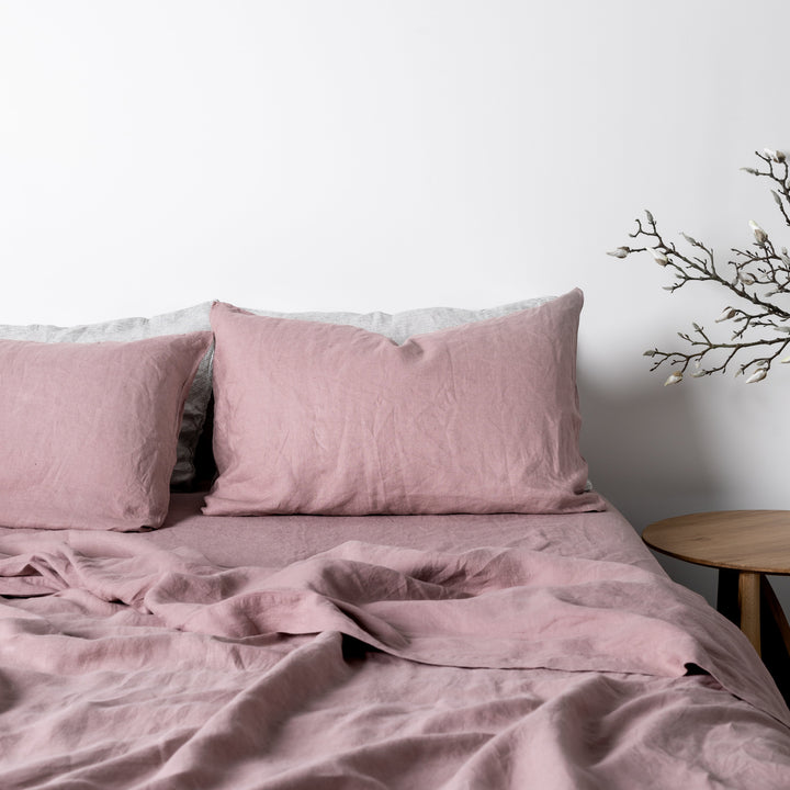 Foxtrot Home French Flax Linen styled in a bedroom with Rosewood Pink Flat Sheet.