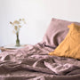 Foxtrot Home French Flax Linen styled in a bedroom with Rosewood Pink Flat Sheet.