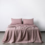 Foxtrot Home French Flax Linen styled in a bedroom with Rosewood Pink Sheets Set.